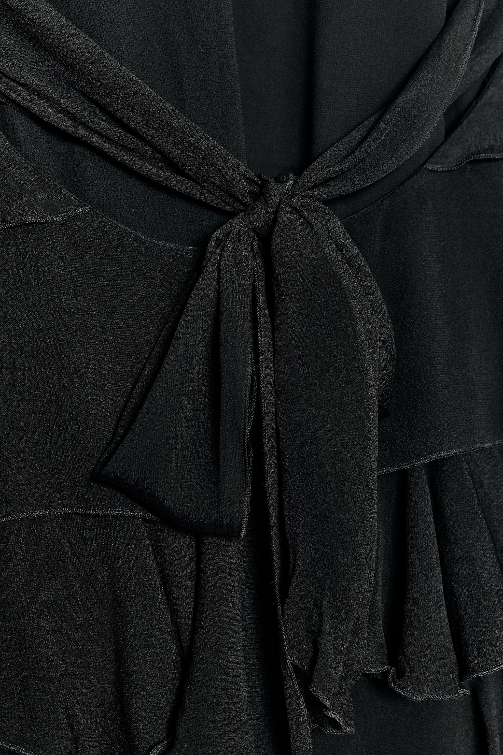 RUFFLED HALTER MINI DRESS